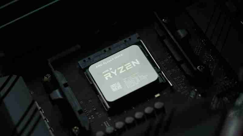 black and gray electronic device - An AMD Ryzen is seated onto a black motherboard. , tags: 9000 und - unsplash